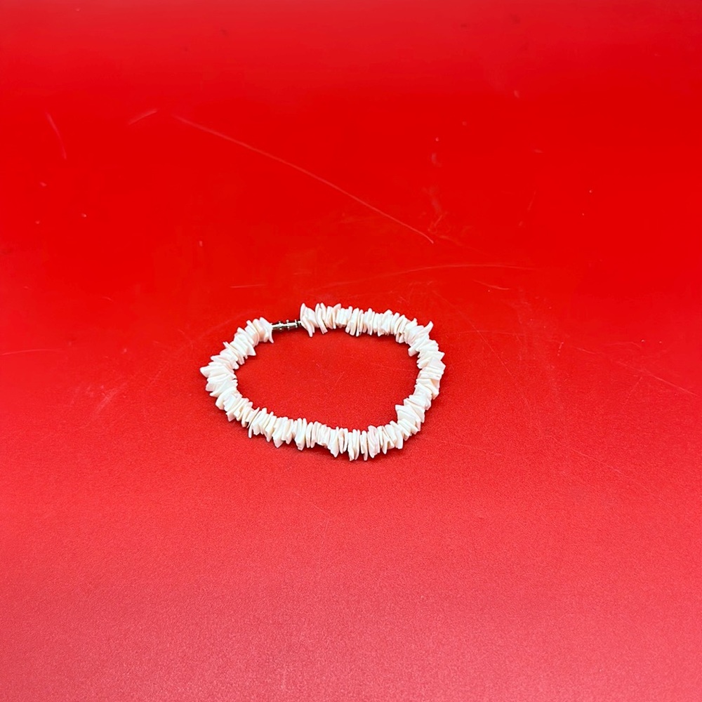 Light pink Hawaiian 7” chipped pula sea shell bracelet